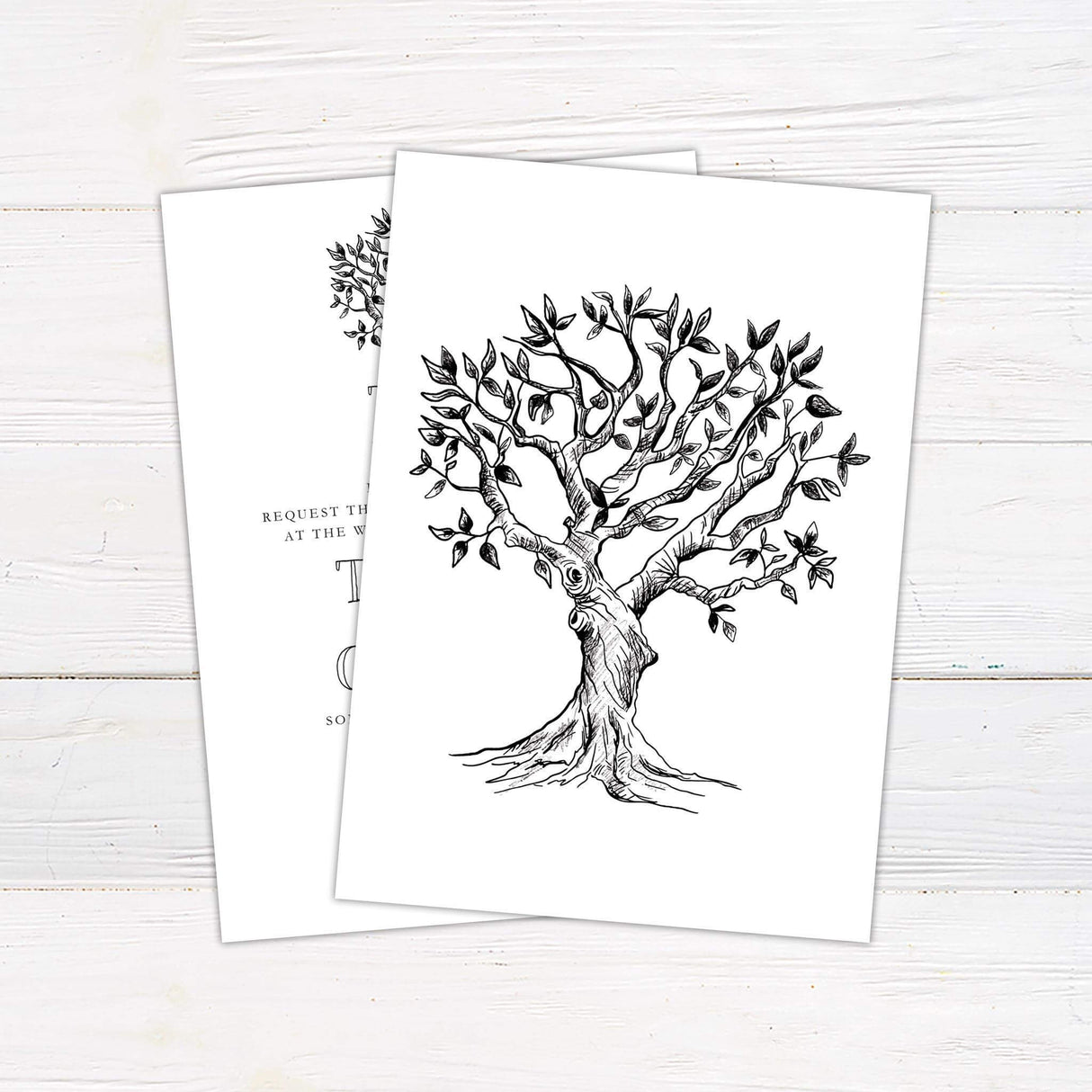 Rustic wedding invitation featuring a hand-drawn tree sketch with initials and artistic serif typography on a clean white background.- back side