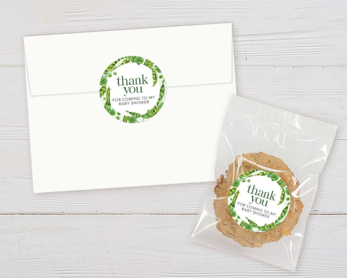 Thank you baby shower favor with greenery circle design on white envelope and cookie bag