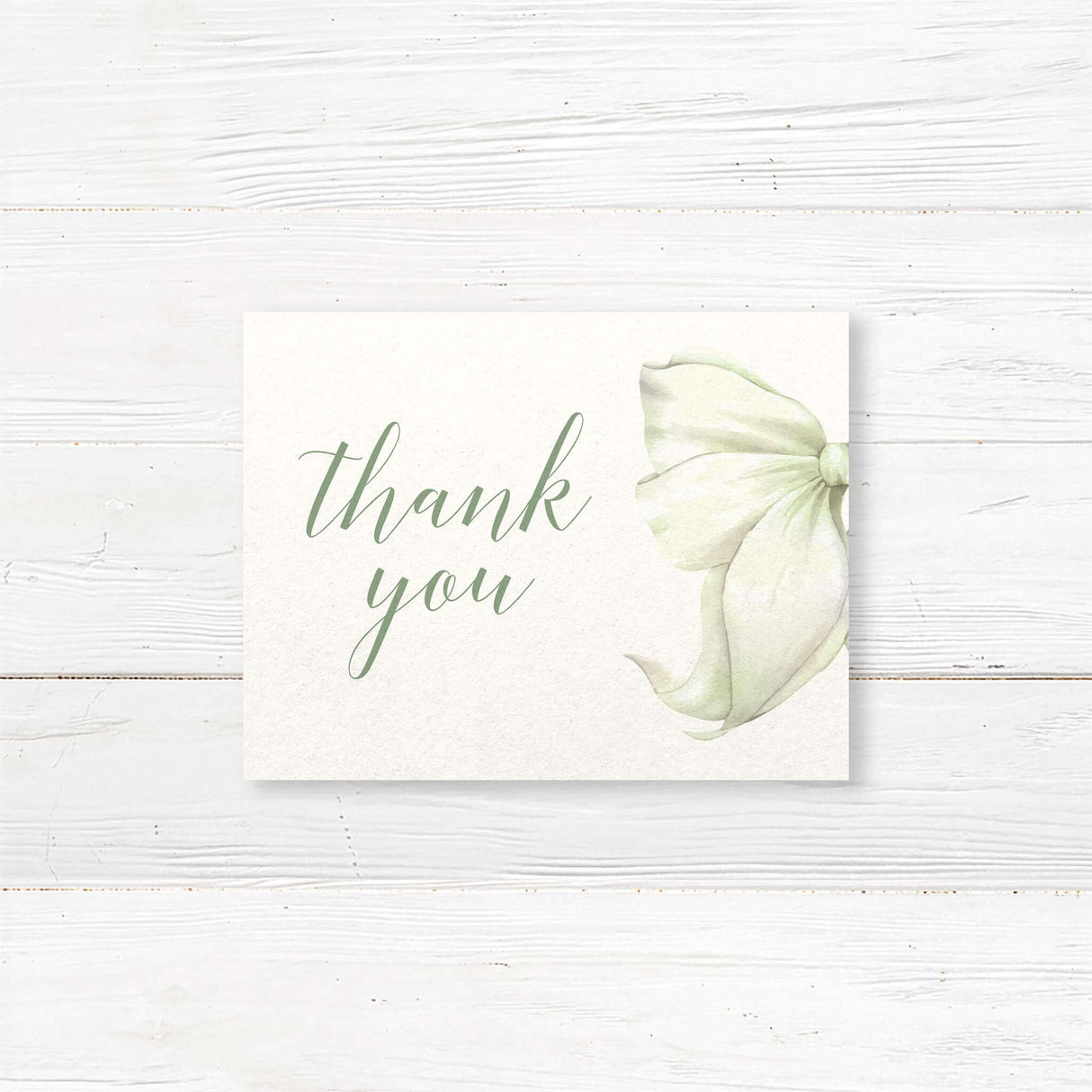 Thank you card with bow and floral wedding design
