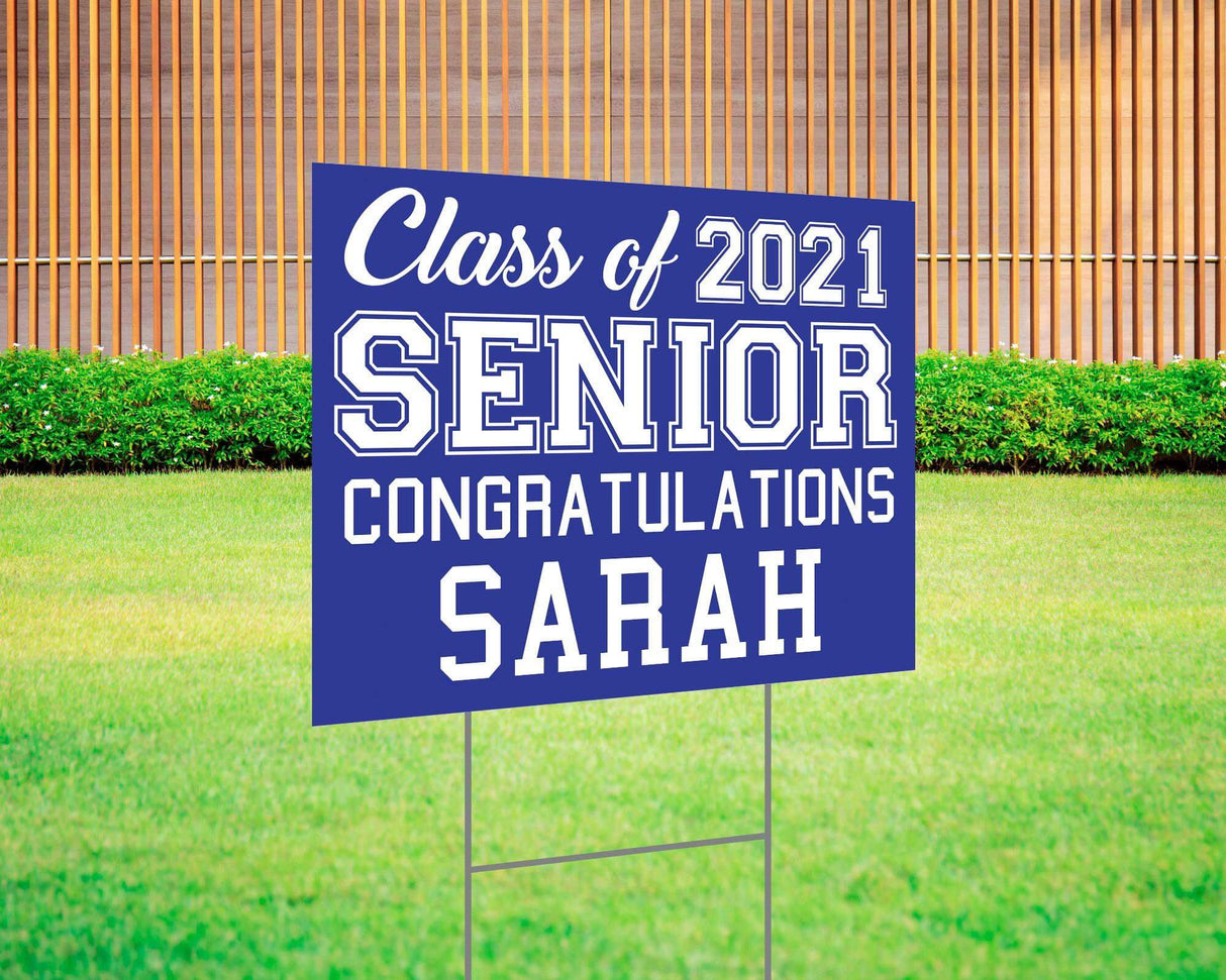 Graduation yard sign featuring bold varsity-style SENIOR lettering, custom class year, and congratulations message. Printed on durable Coreplast plastic, available in custom colors and single or double-sided print, perfect for high school and college graduates. blue