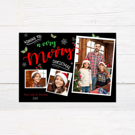 Very Merry Christmas card with black background, red and green festive lettering, three family photos, and personalized holiday greeting.