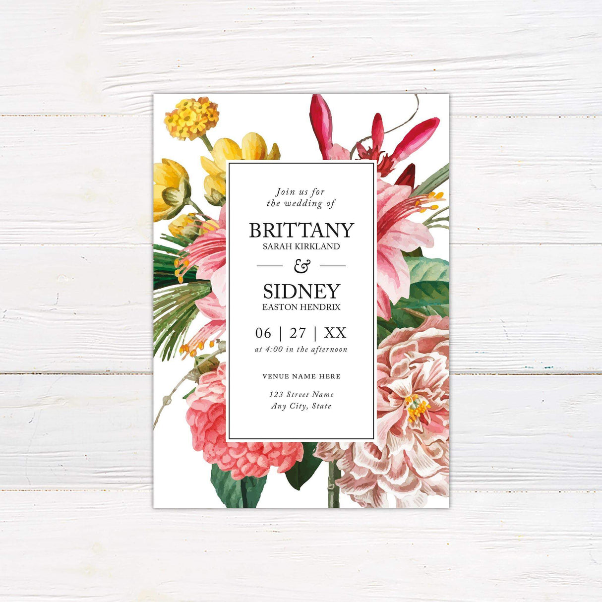 Colorful wedding invitation with tropical watercolor flowers and a clean white center panel with elegant serif and italic fonts.