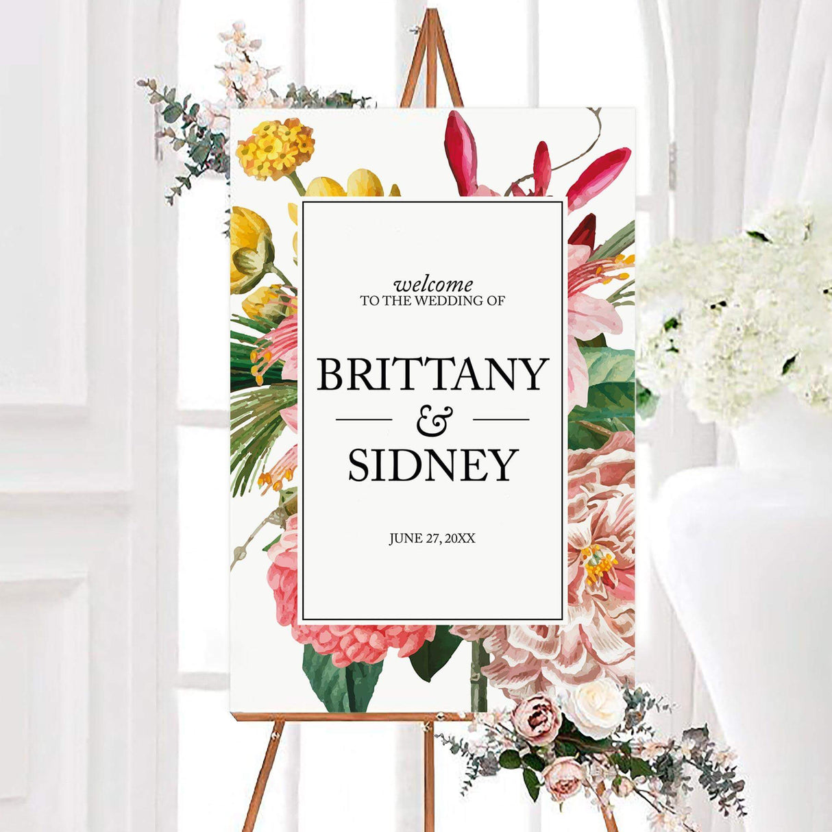 Colorful vibrant beauty wedding welcome sign featuring vibrant flowers, greenery, and elegant personalized lettering. The printed sign can be customized with the couple’s names and wedding date.