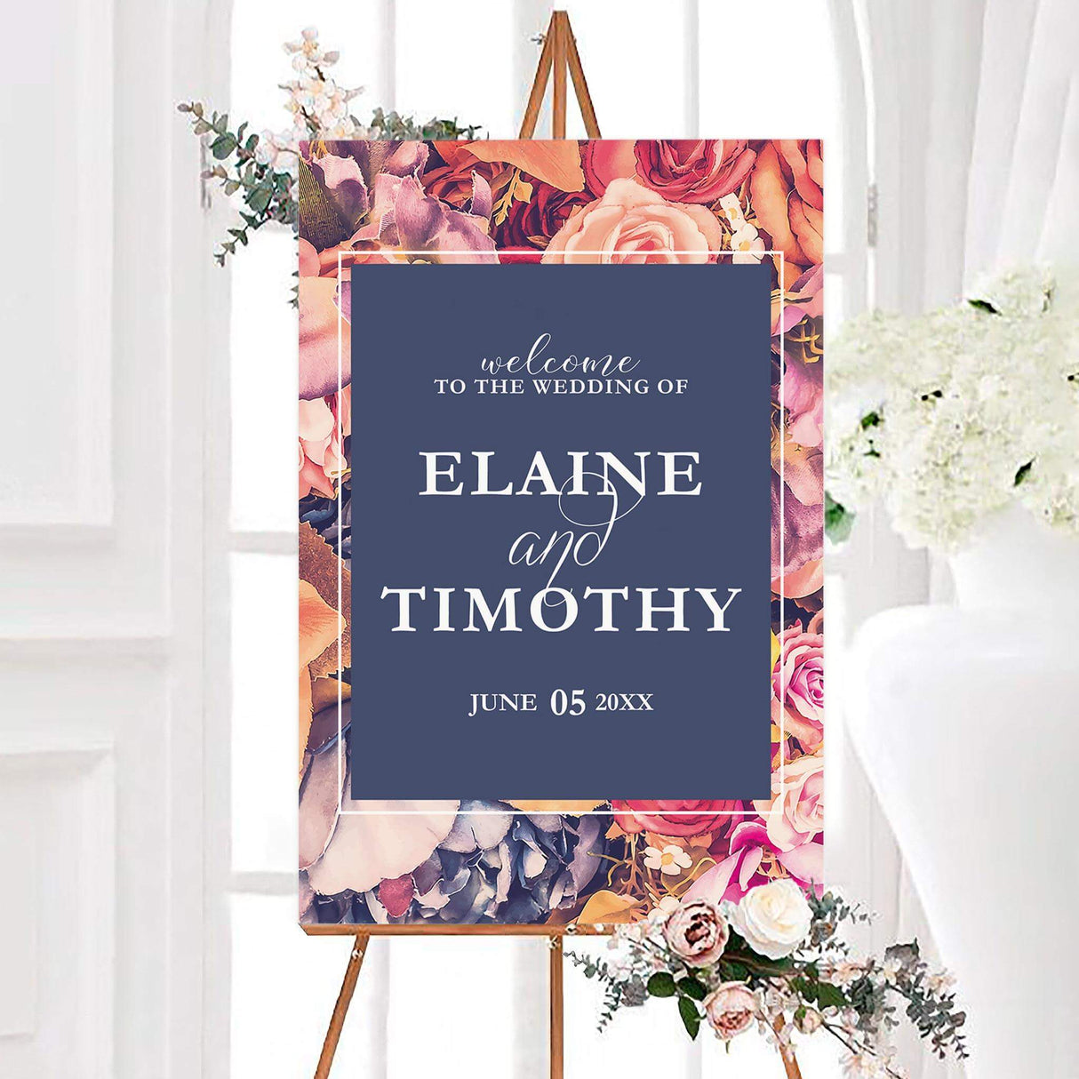 Welcome sign with vivid floral border and navy background, perfect for wedding entrance décor.