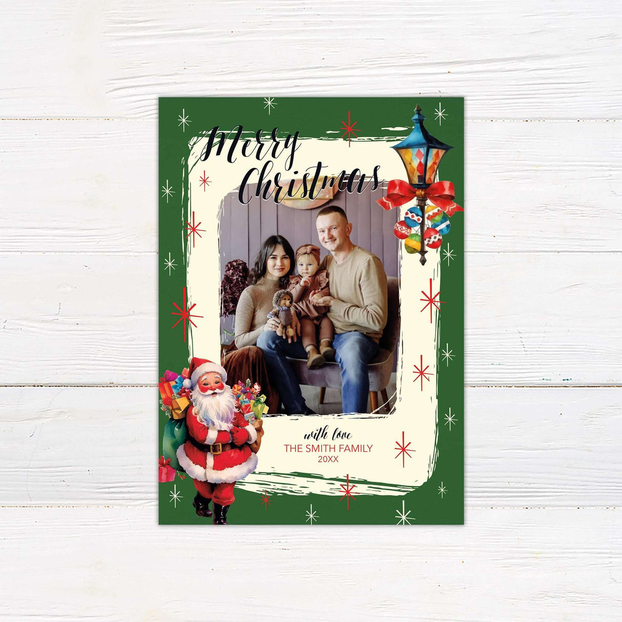 Vintage look Christmas card with family photo, retro Santa, holiday lamp post, and green and cream background with red starburst accents