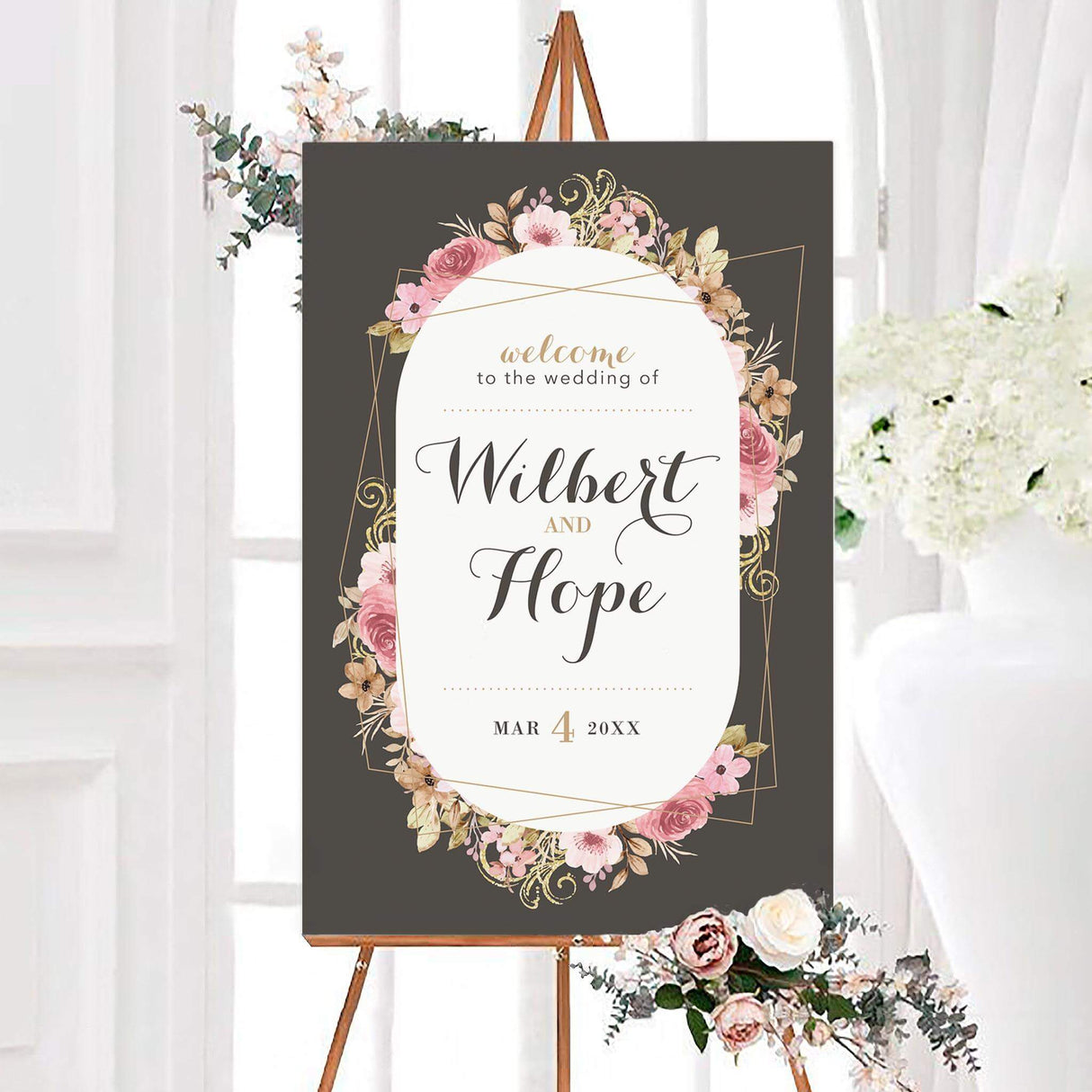 Romantic vintage pink floral wedding welcome sign featuring watercolor flowers, decorative flourishes, and personalized couple names in elegant script. The design includes a custom wedding date surrounded by lush floral accents.