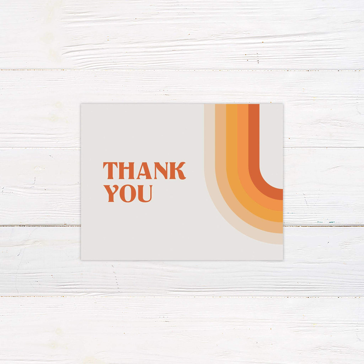 Thank you card with orange and yellow stripes and vintage-style font.