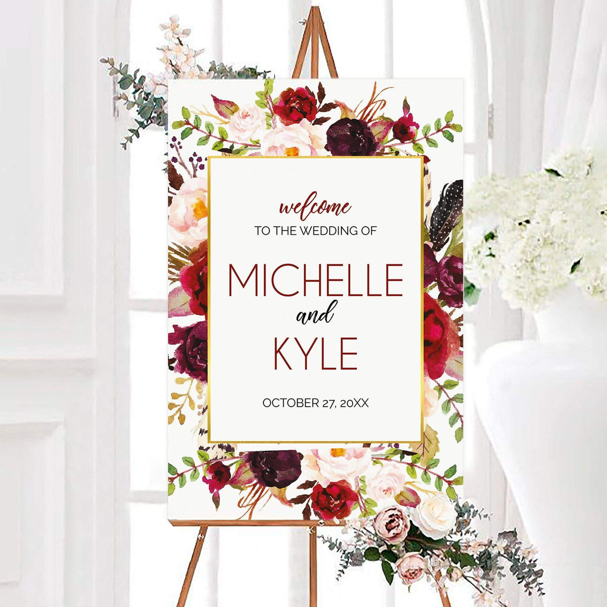 Welcome sign with deep red, burgundy, blush, and ivory watercolor florals framing a white text box with modern script