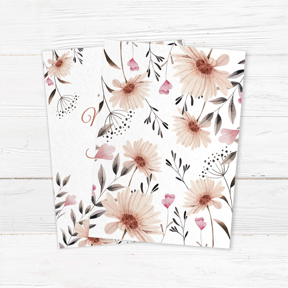 Elegant floral wedding invitation featuring soft watercolor wildflowers and botanical greenery on textured cardstock. Customizable with names, date, and venue details. Perfect for rustic, boho, garden, and outdoor weddings. Professionally printed with matching envelopes included for a complete wedding stationery suite. back