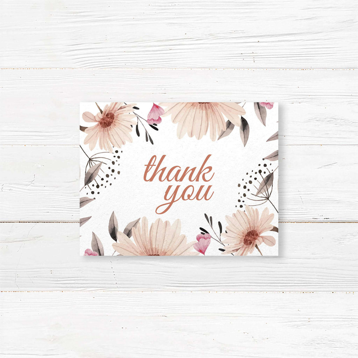 Elegant floral thank you card featuring delicate watercolor blooms and handwritten-style calligraphy. Printed on high-quality cardstock, available in folded or flat options with matching envelopes. Perfect for expressing gratitude after weddings, bridal showers, or engagements while maintaining a rustic, romantic touch.