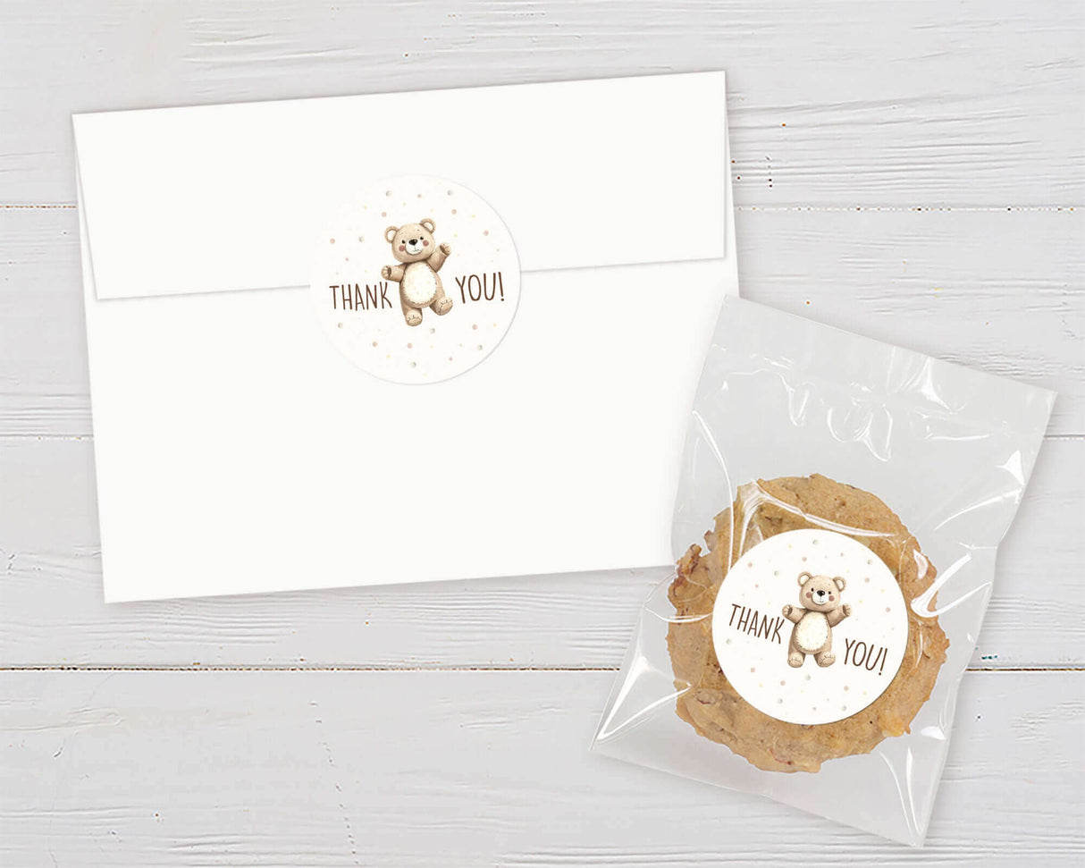"We Can Bearly Wait" baby shower thank you card and treat bag with teddy bear design on white background.