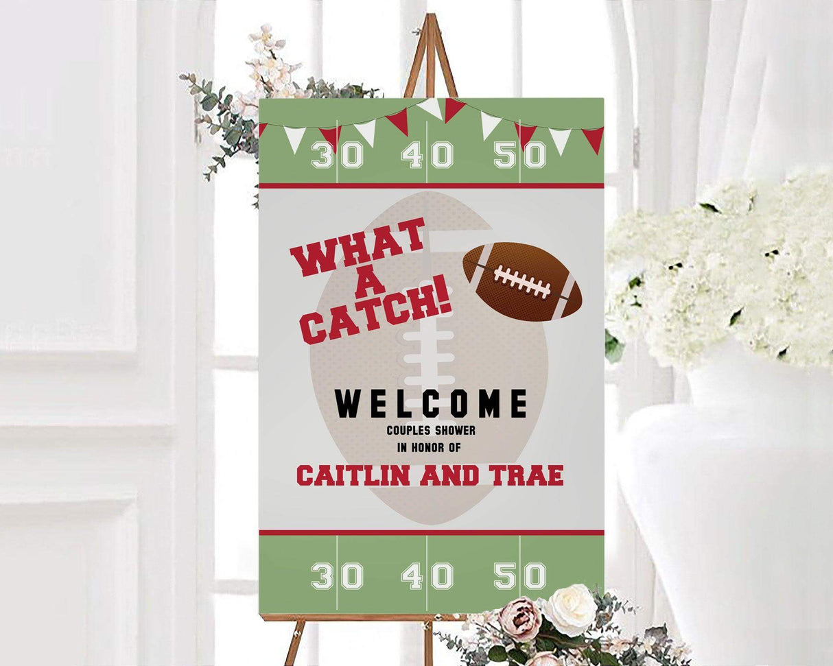 A "What a Catch" football-themed couples shower sign with field markings and bold text. The design uses red, green, and gray colors.