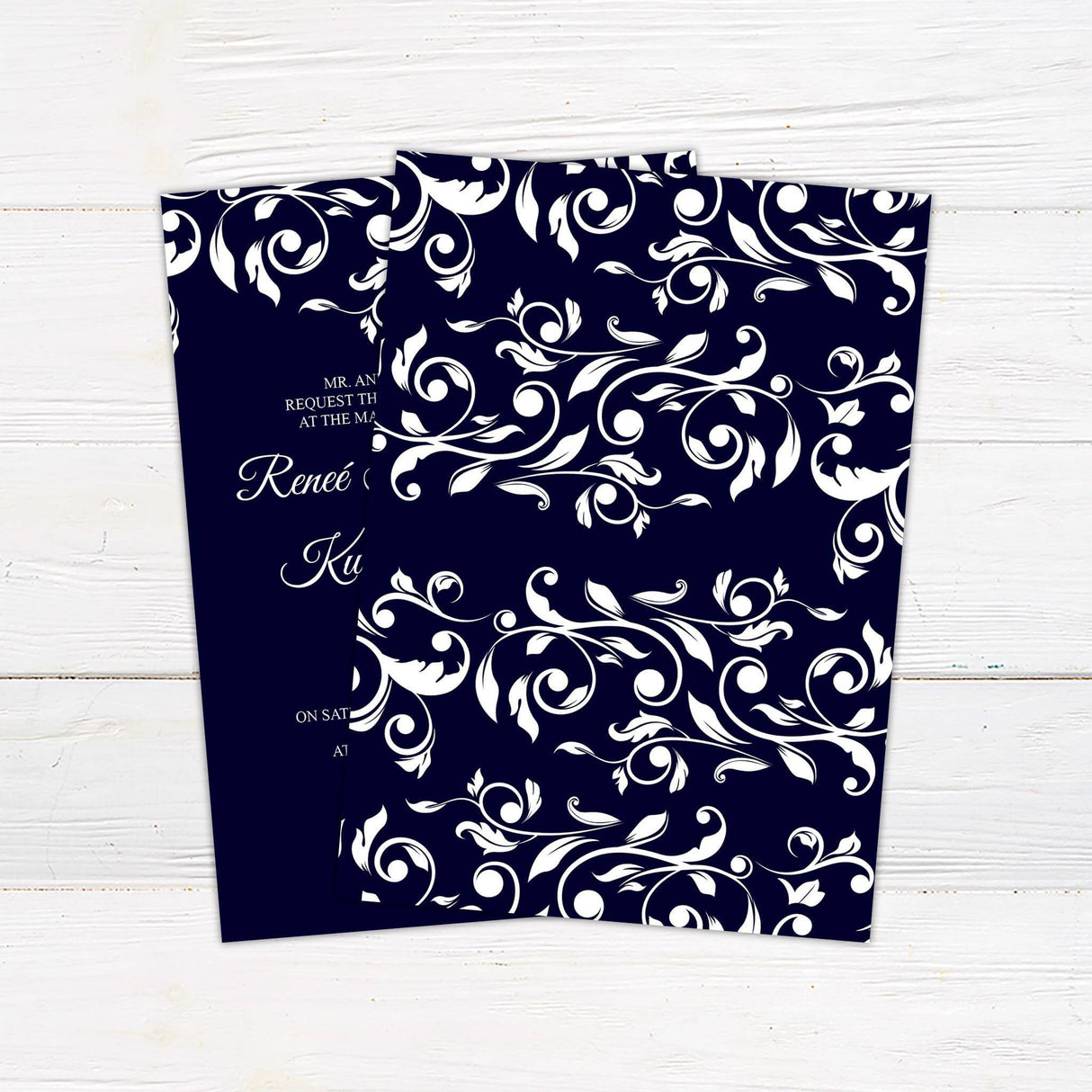 Navy wedding invitation with elegant white vine design and formal script and serif fonts.- back side