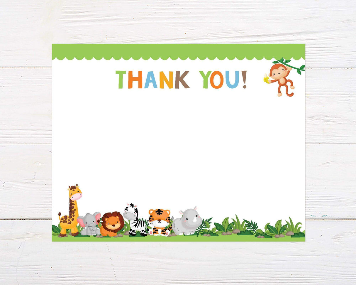 A colorful thank you card with cartoon jungle animals at the bottom, including a giraffe, elephant, lion, zebra, tiger, and hippo. A monkey holding a banana hangs from a leafy branch near the top, with multicolored “THANK YOU!” text above.