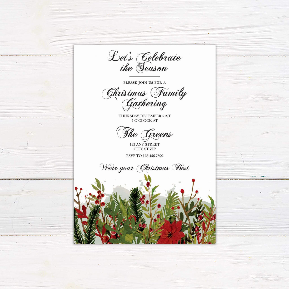 Elegant invitation for a holiday gathering featuring red and green watercolor florals and pine branches along the bottom. Formal script fonts invite guests to a Christmas family event at a specified location.
