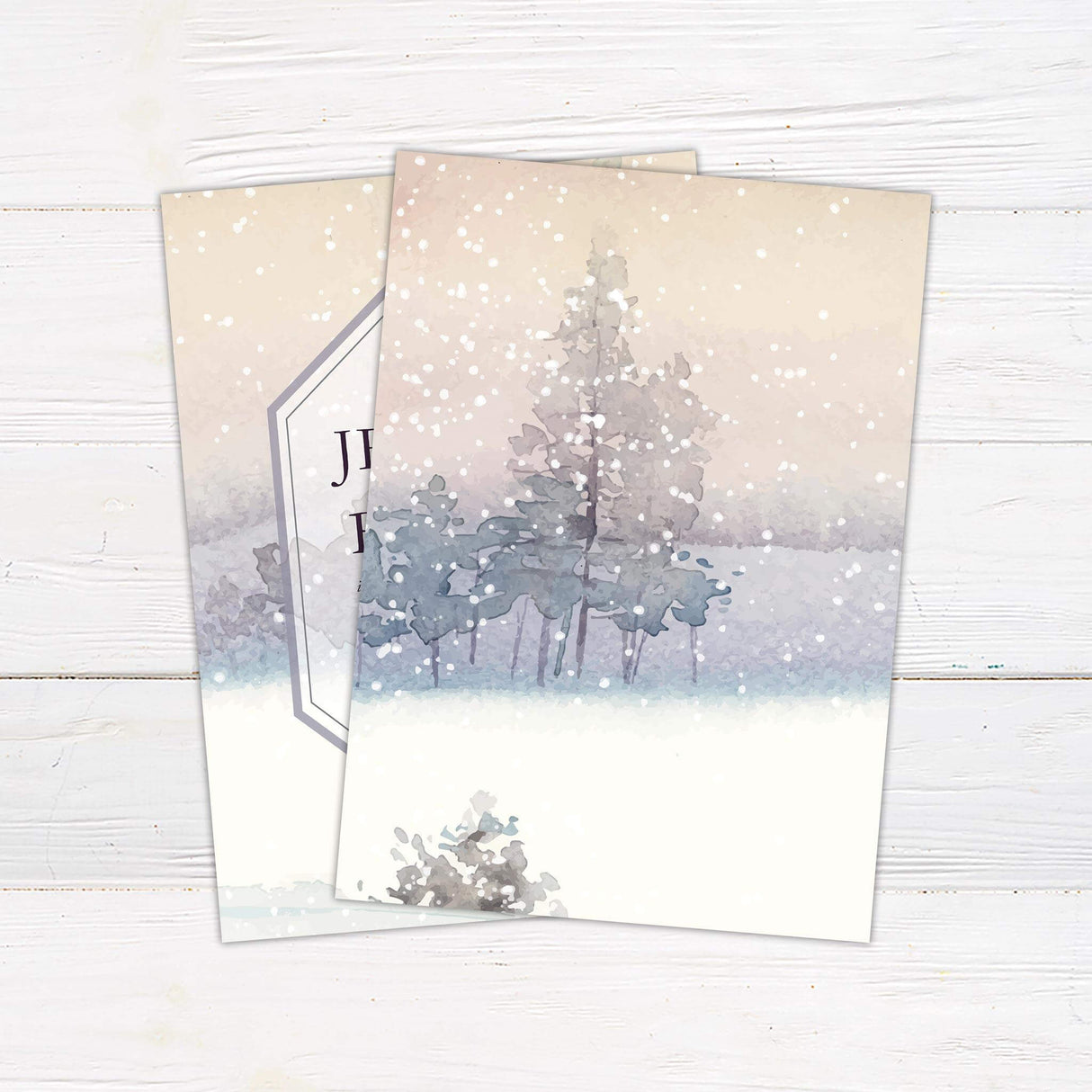 Winter forest wedding invitation with watercolor snowy trees, soft muted background, and a modern geometric frame.- back side