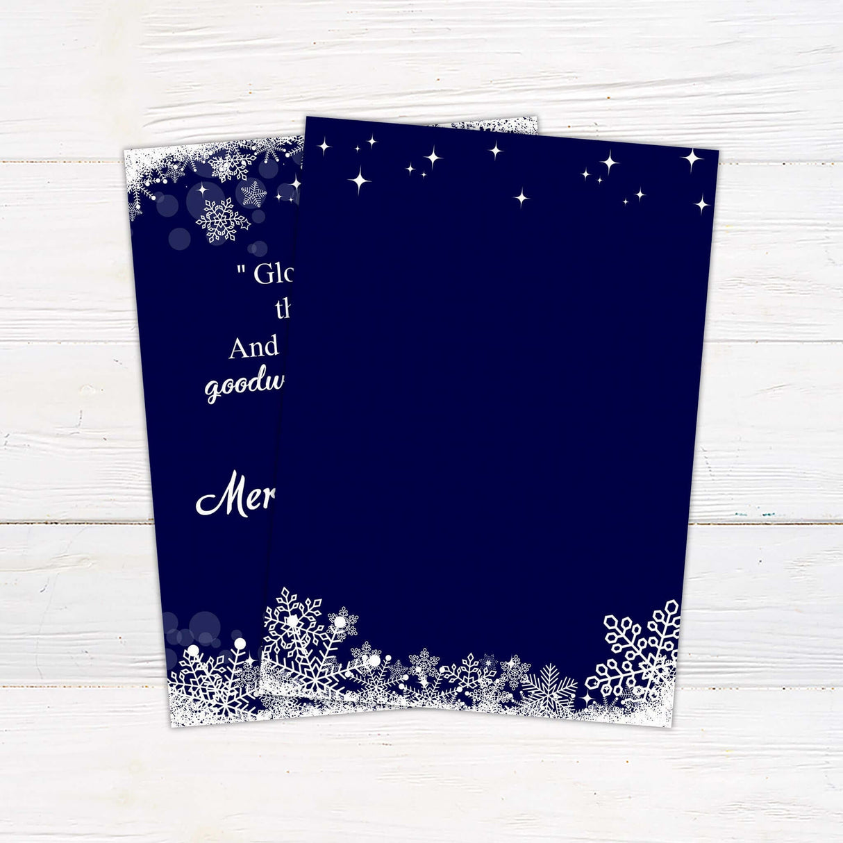 A navy Christmas card with white snowflake accents and customizable text. Personalized with family name, year, and holiday message for a unique design.