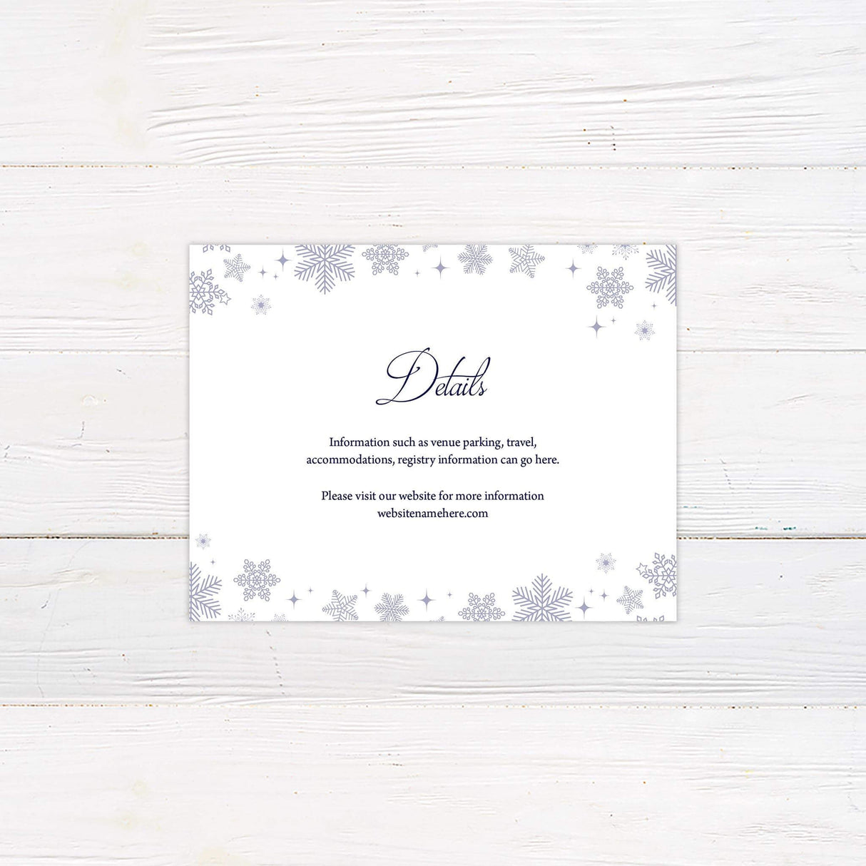 White details card with snowflakes on top and bottom border and elegant script for a winter theme.