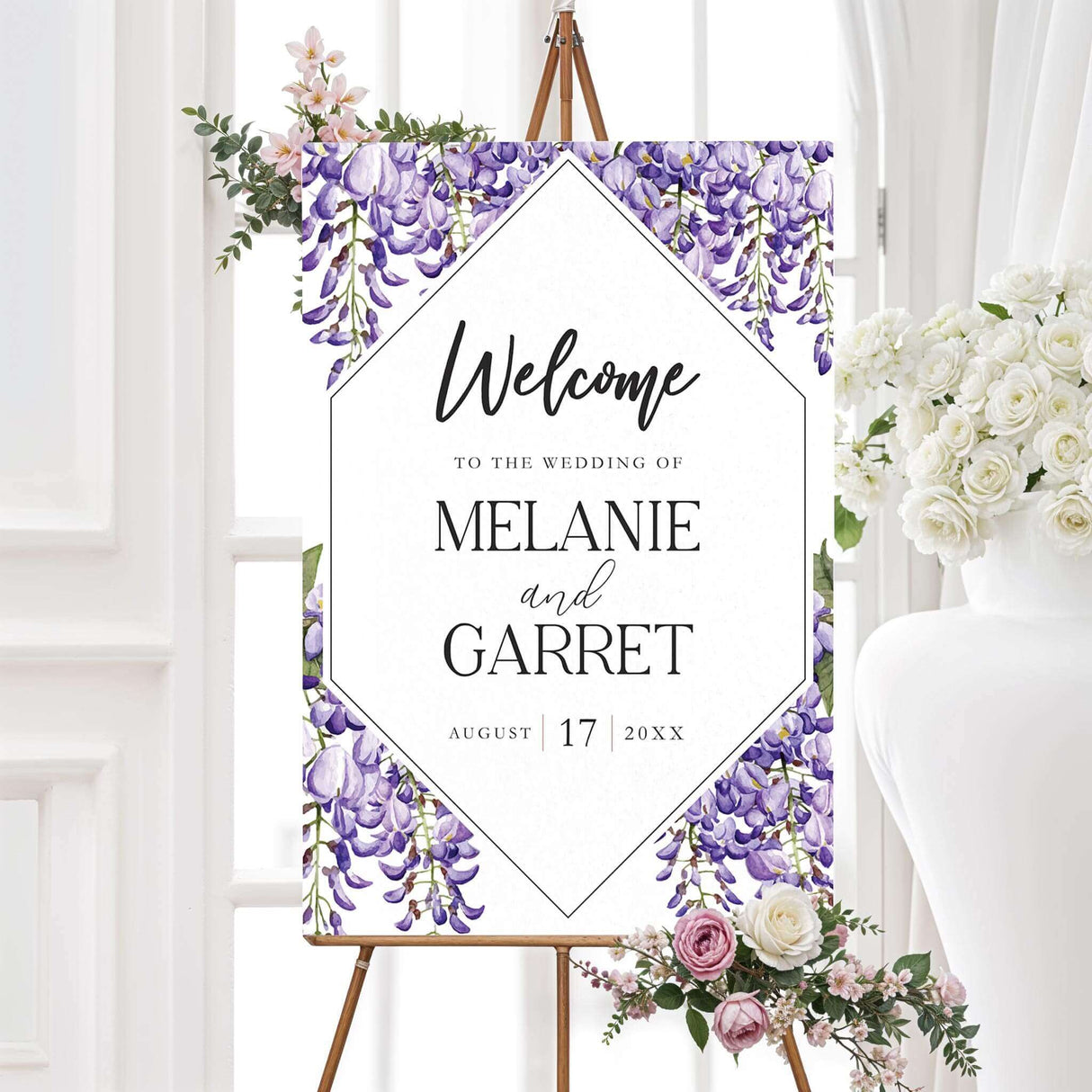 Welcome sign with lavender watercolor wisteria florals and serif text. Printed for wedding entrances and ceremony spaces. Coordinates with Wisteria Bliss suite.