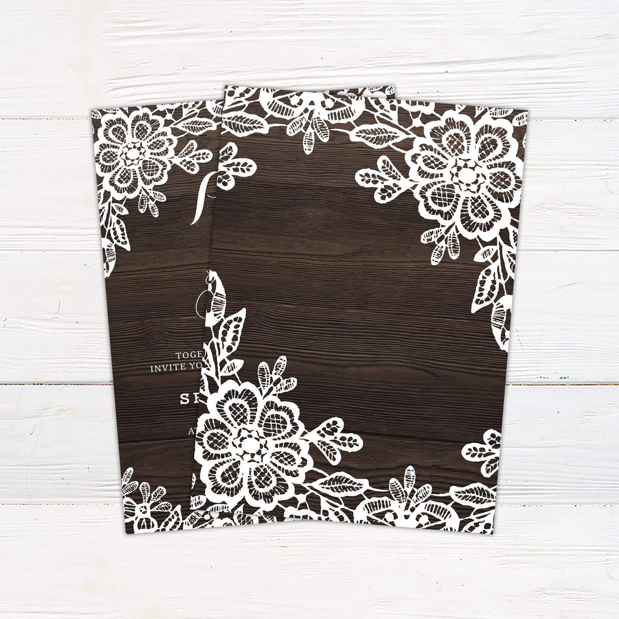 Rustic wood wedding invitation with white lace floral edges and elegant script text.- back side