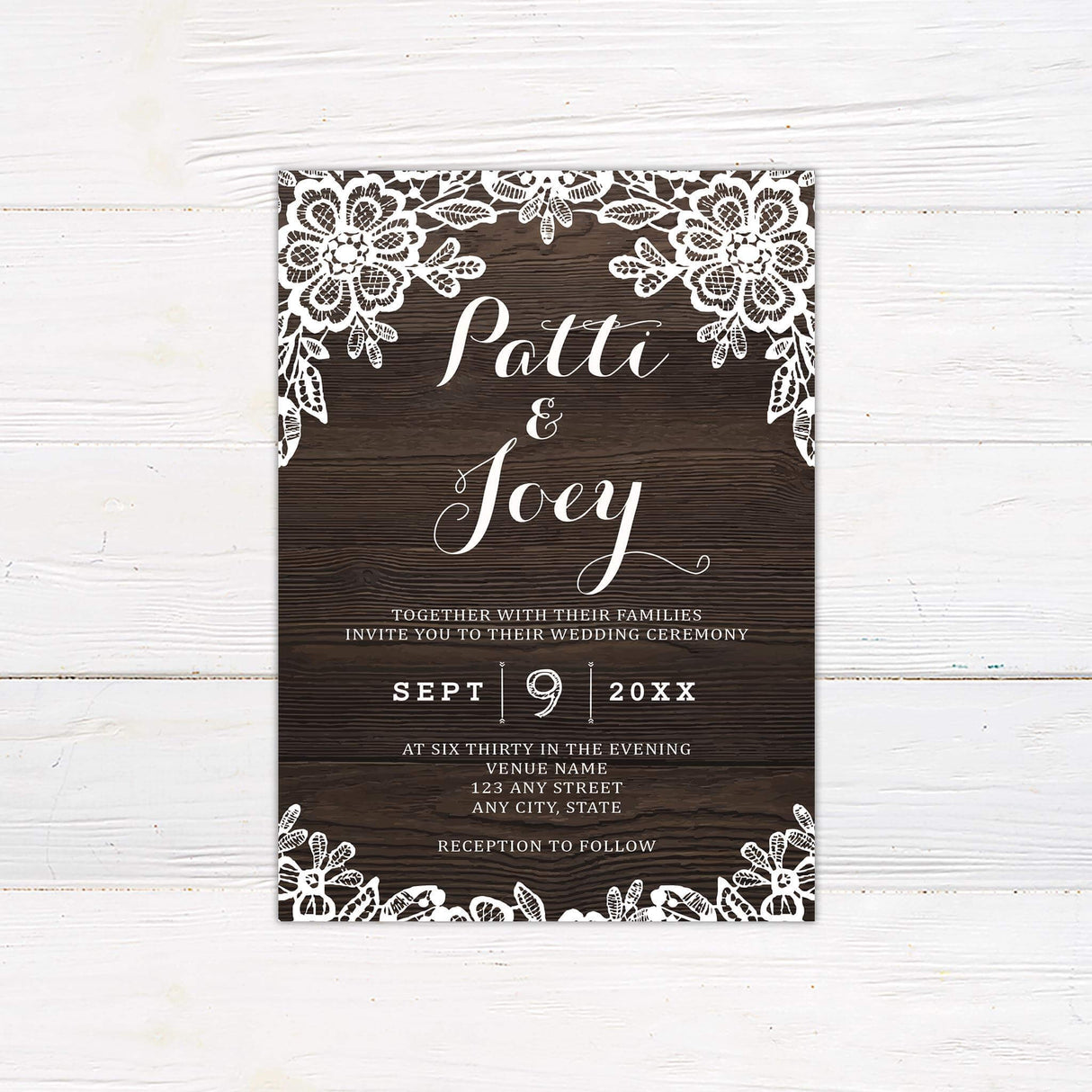 Rustic wood wedding invitation with white lace floral edges and elegant script text.