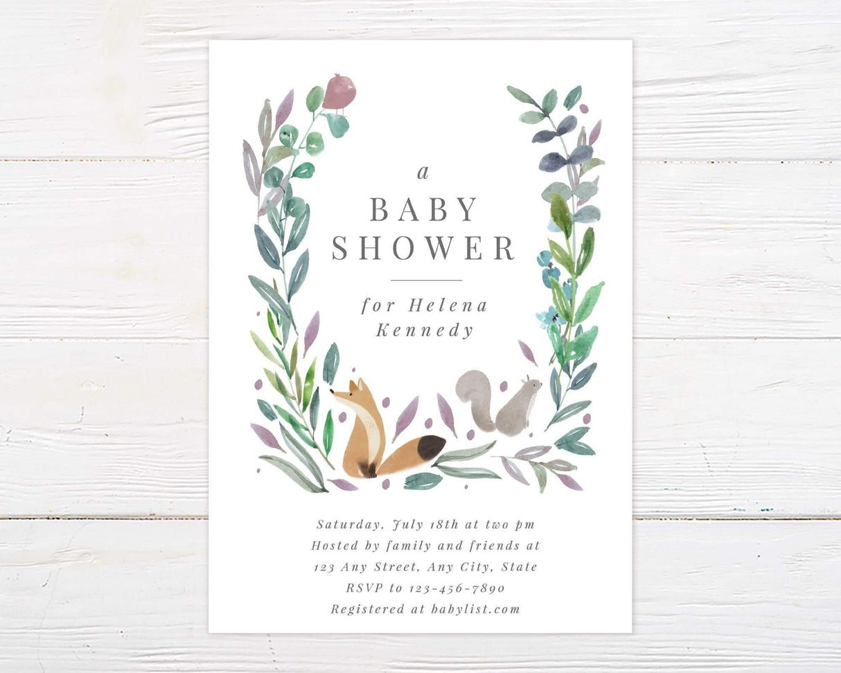Woodland-themed baby shower invitation featuring watercolor greenery, a fox, and a squirrel. The design includes soft, earthy tones and elegant typography, inviting guests to celebrate the mom-to-be. The text provides event details, RSVP information, and a baby registry link.