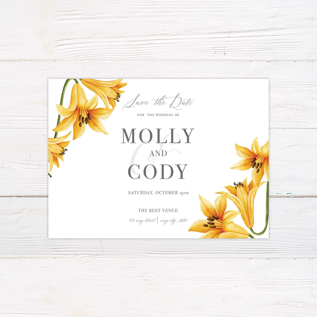 Elegant printed save the date with yellow lily floral design, featuring classic typography and soft botanical accents for a romantic wedding theme."