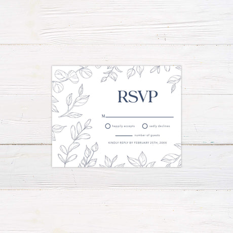 Understanding the RSVP Invite Meaning on a decorative RSVP card featuring floral designs.