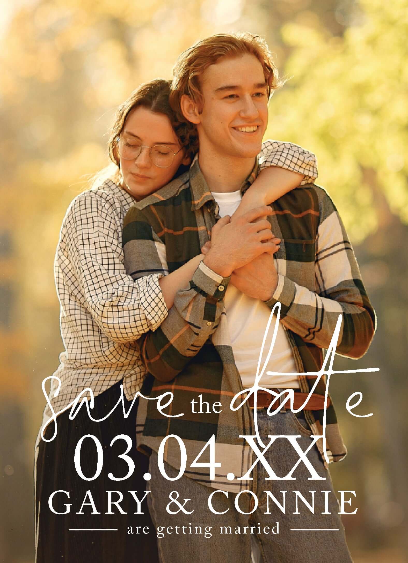 The Ultimate Guide to Wedding Invitations featuring a joyful couple announcing their wedding date in a beautiful outdoor setting.