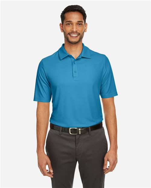 CORE365 Men’s Fusion ChromaSoft™ piqué polo with a lightweight, smooth feel and modern athletic fit. Features moisture-wicking fabric and a classic collar, ideal for work or everyday wear.