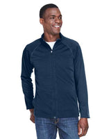 Devon & Jones Men’s Stretch Tech-Shell® Compass full-zip jacket with a sleek, modern fit and flexible performance fabric. Features a full-zip front and weather-resistant design, ideal for outdoor wear or layering.