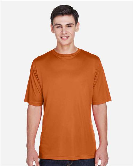 Team 365 Men’s Zone Performance t-shirt with a lightweight, breathable design and athletic fit. Features moisture-wicking fabric, ideal for workouts, sports, or everyday wear.