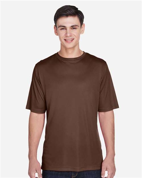 Team 365 Men’s Zone Performance t-shirt with a lightweight, breathable design and athletic fit. Features moisture-wicking fabric, ideal for workouts, sports, or everyday wear.