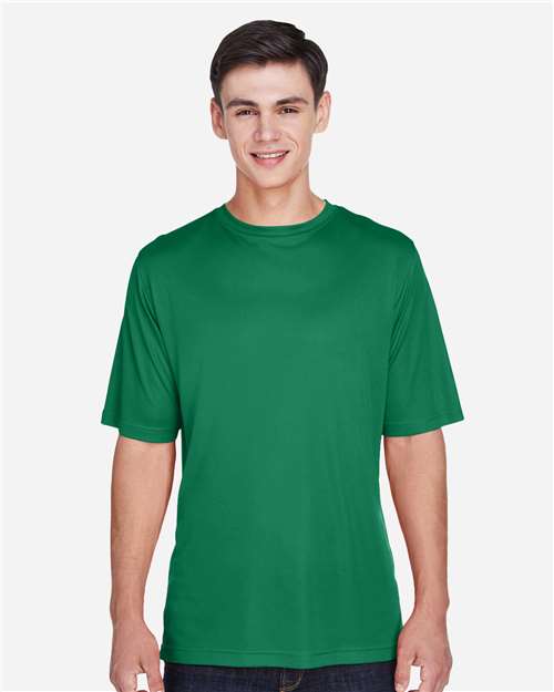 Team 365 Men’s Zone Performance t-shirt with a lightweight, breathable design and athletic fit. Features moisture-wicking fabric, ideal for workouts, sports, or everyday wear.