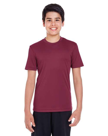 Team 365 Youth Zone Performance t-shirt with a lightweight, breathable design and athletic fit. Features moisture-wicking fabric, perfect for sports, school, or everyday active wear.