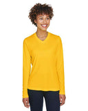 Team 365 Women’s Zone Performance long sleeve t-shirt with a lightweight, breathable design and flattering athletic fit. Features moisture-wicking fabric, making it ideal for workouts, layering, or everyday active wear.