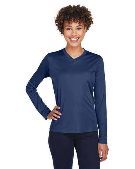 Team 365 Women’s Zone Performance long sleeve t-shirt with a lightweight, breathable design and flattering athletic fit. Features moisture-wicking fabric, making it ideal for workouts, layering, or everyday active wear.
