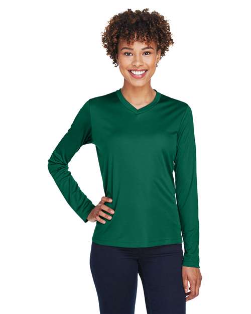 Team 365 Women’s Zone Performance long sleeve t-shirt with a lightweight, breathable design and flattering athletic fit. Features moisture-wicking fabric, making it ideal for workouts, layering, or everyday active wear.