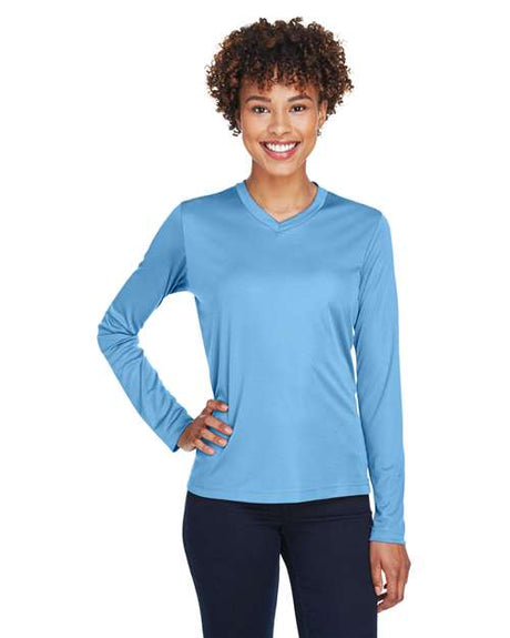 Team 365 Women’s Zone Performance long sleeve t-shirt with a lightweight, breathable design and flattering athletic fit. Features moisture-wicking fabric, making it ideal for workouts, layering, or everyday active wear.