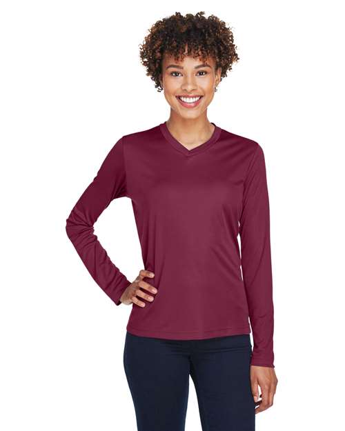 Team 365 Women’s Zone Performance long sleeve t-shirt with a lightweight, breathable design and flattering athletic fit. Features moisture-wicking fabric, making it ideal for workouts, layering, or everyday active wear.