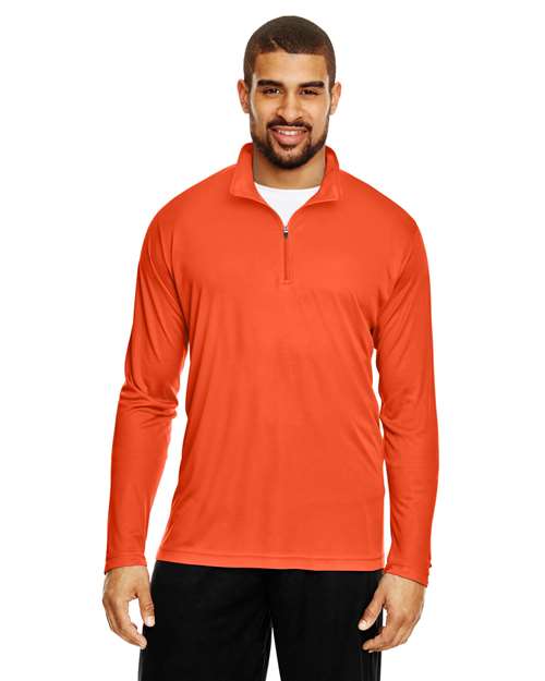 Team 365 Men’s Zone Performance quarter-zip pullover with a lightweight, breathable design and athletic fit. Features moisture-wicking fabric and a zip-up collar, ideal for layering or active wear.