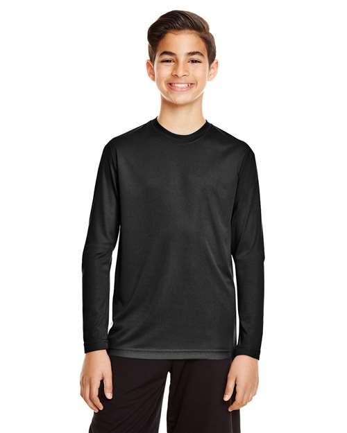 Team 365 Youth Zone Performance long sleeve t-shirt with a lightweight, breathable design and athletic fit. Features moisture-wicking fabric, making it ideal for sports, school, or everyday active wear.