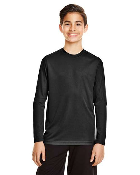 Team 365 Youth Zone Performance long sleeve t-shirt with a lightweight, breathable design and athletic fit. Features moisture-wicking fabric, making it ideal for sports, school, or everyday active wear.