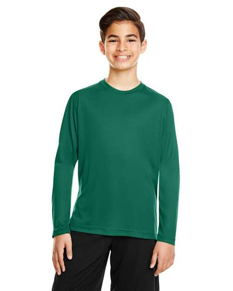 Team 365 Youth Zone Performance long sleeve t-shirt with a lightweight, breathable design and athletic fit. Features moisture-wicking fabric, making it ideal for sports, school, or everyday active wear.