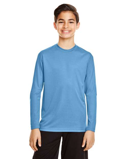 Team 365 Youth Zone Performance long sleeve t-shirt with a lightweight, breathable design and athletic fit. Features moisture-wicking fabric, making it ideal for sports, school, or everyday active wear.