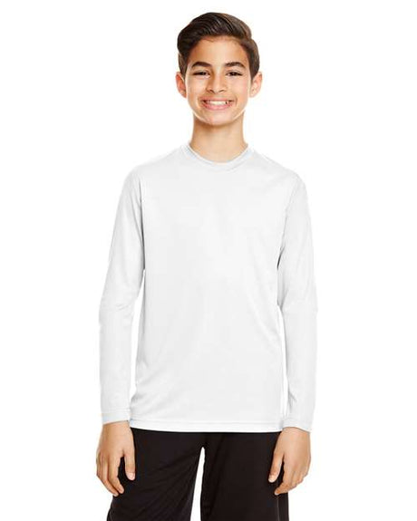 Team 365 Youth Zone Performance long sleeve t-shirt with a lightweight, breathable design and athletic fit. Features moisture-wicking fabric, making it ideal for sports, school, or everyday active wear.