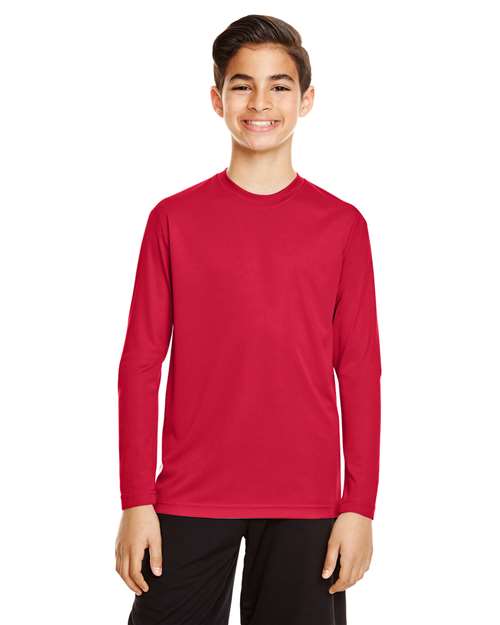 Team 365 Youth Zone Performance long sleeve t-shirt with a lightweight, breathable design and athletic fit. Features moisture-wicking fabric, making it ideal for sports, school, or everyday active wear.