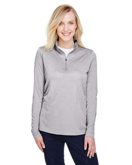 Team 365 Women’s Zone Sonic Heather performance quarter-zip pullover with a lightweight, athletic fit and heathered texture. Features moisture-wicking fabric and a zip-up collar, perfect for layering during workouts or casual wear.