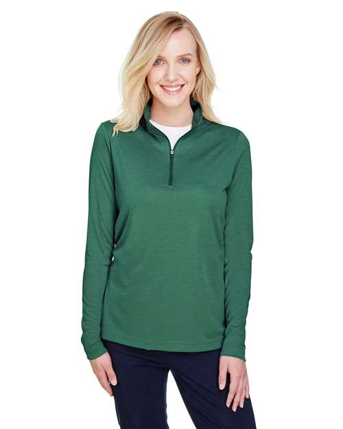 Team 365 Women’s Zone Sonic Heather performance quarter-zip pullover with a lightweight, athletic fit and heathered texture. Features moisture-wicking fabric and a zip-up collar, perfect for layering during workouts or casual wear.