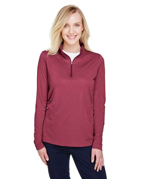 Team 365 Women’s Zone Sonic Heather performance quarter-zip pullover with a lightweight, athletic fit and heathered texture. Features moisture-wicking fabric and a zip-up collar, perfect for layering during workouts or casual wear.